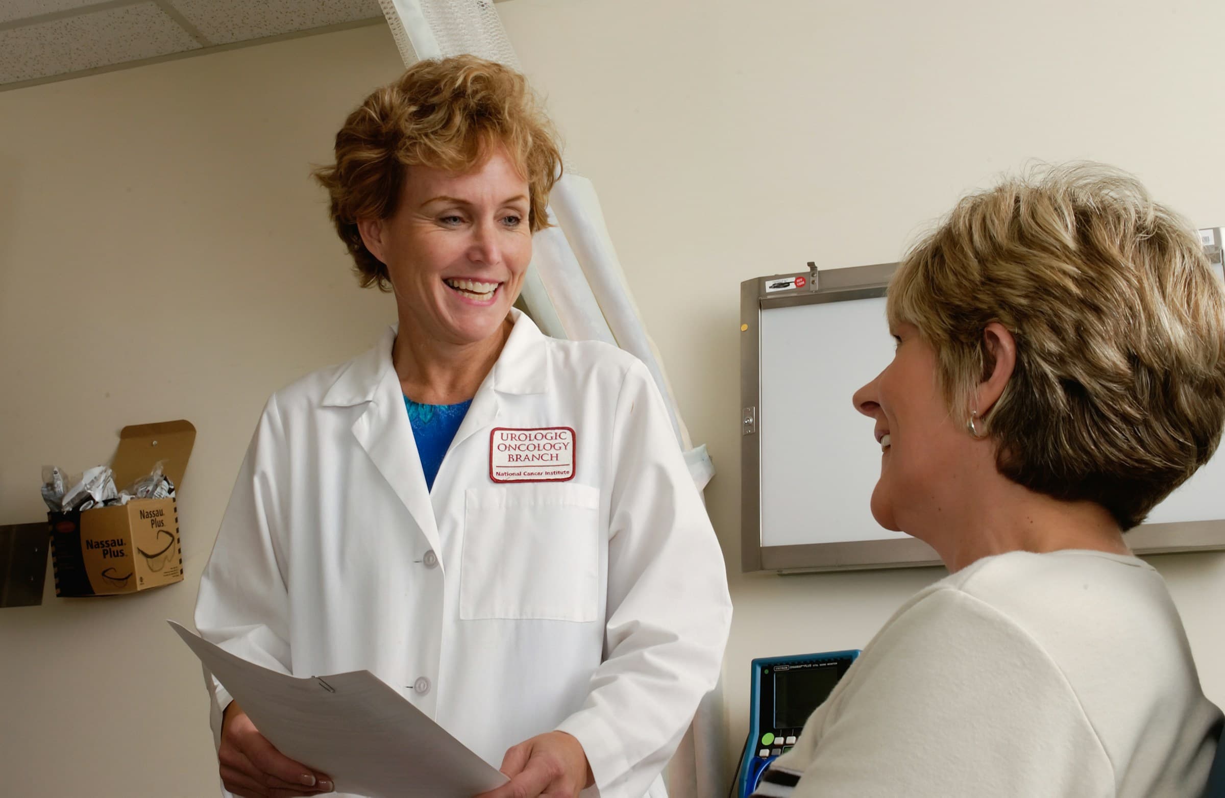 A doctor talking with a patient during an appointment